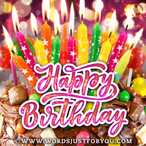 Beautiful Chocolate Cake Happy Birthday Gif With Candies And Colourful Lit Candles